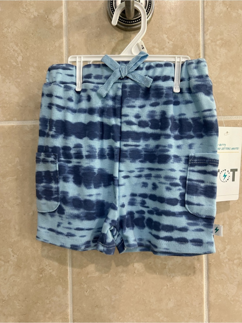Team of Tiny blue Tie Dye shorts